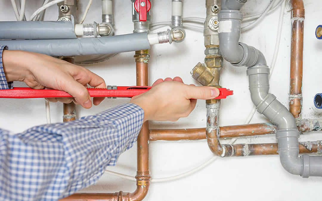 What factors should be considered when selecting a plumber?